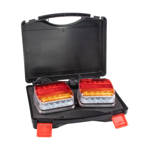 Dve zadné LED svetlá uložené v otvorenom prepravnom kufríku s penovou výplňou