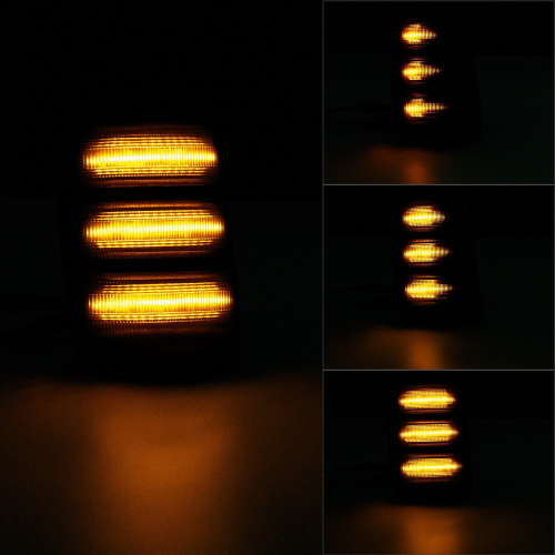 LED smerovka so sekvenčným oranžovým blikaním na tmavom pozadí